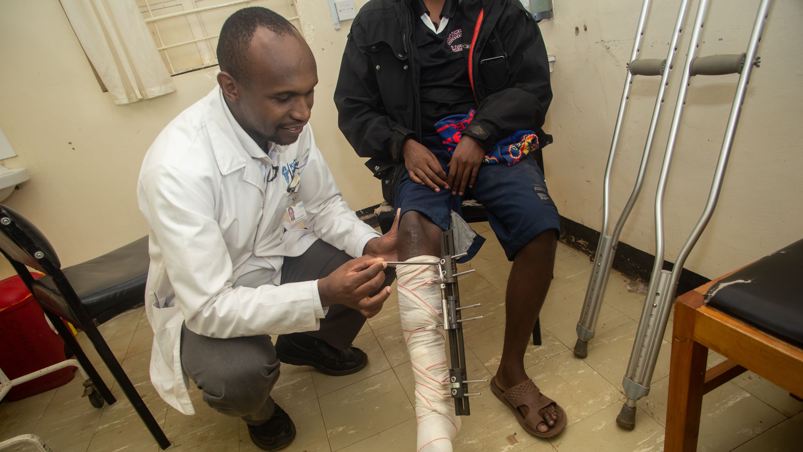 Dr Chege Mwangi with a patient.